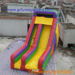 colorful slide inflatable bouncer